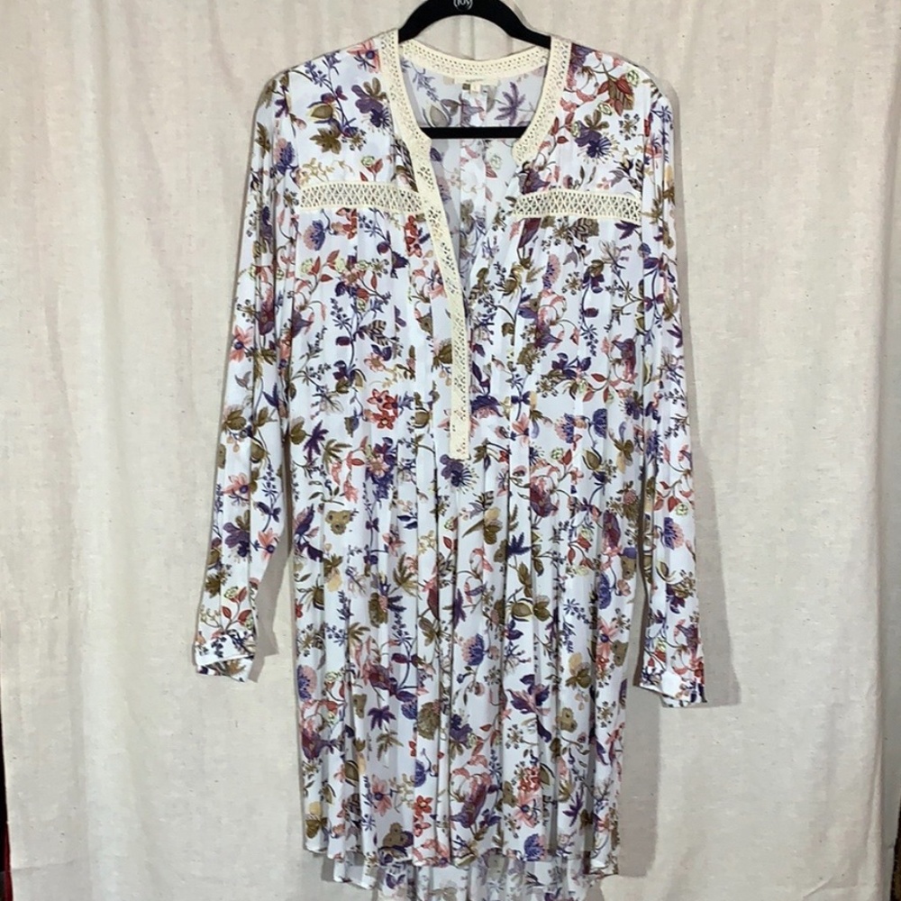 Flowing floral print top.